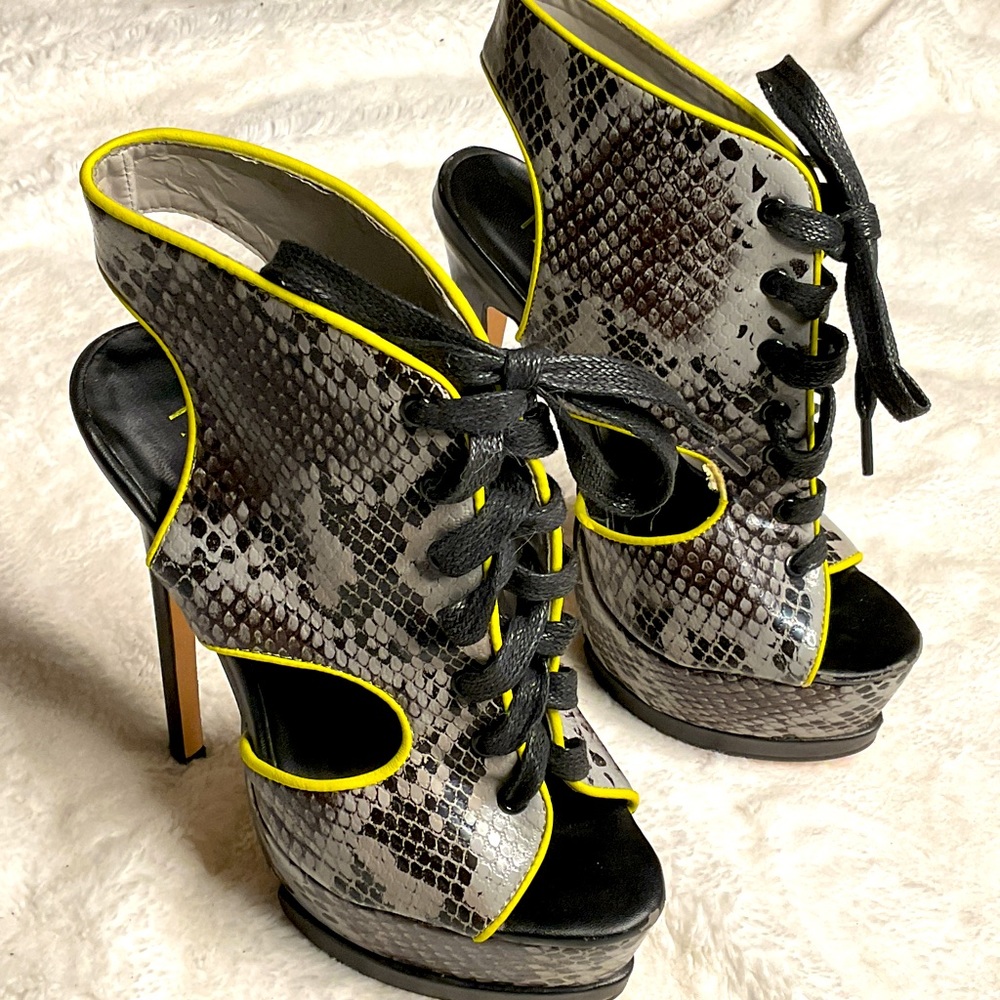 Paper Fox 🦊 brand, peek-a-boo cut out, snakeskin heels, with neon yellow trim.